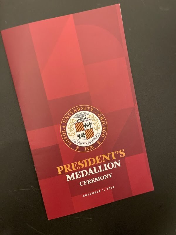 The exterior cover of Loyola Chicago's 2024 President's Medallion Awrads booklet